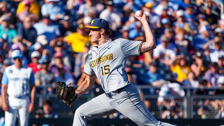 Jun 14, 2026; Omaha, NE, USA; West Virginia Mountaineers starting pitcher Maxx Yehl (15) pitches against the North Carolina Tar Heels during the first inning at Charles Schwab Field. Jun 14, 2026; Omaha, NE, USA; West Virginia Mountaineers starting pitcher Maxx Yehl (15) pitches against the North Carolina Tar Heels during the first inning at Charles Schwab Field.