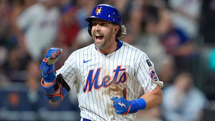 Aug 25, 2025; New York City, New York, USA; New York Mets second baseman Jeff McNeil (1) reacts to hitting an RBI single against the Philadelphia Phillies during the fourth inning at Citi Field. Mandatory Credit: Gregory Fisher-Imagn Images