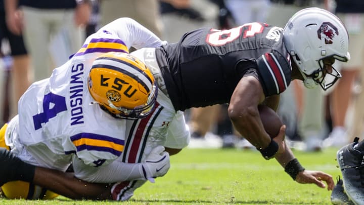 The Atlanta Falcons hosted LSU Tigers defensive end Bradyn Swinson (4) on a pre-draft visit Wednesday.