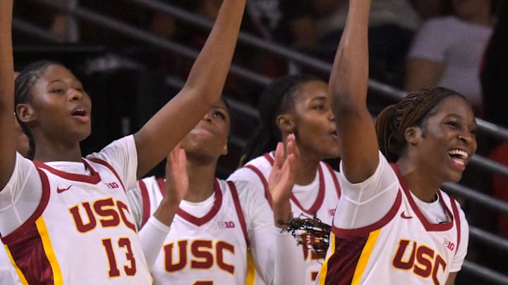 Jan 29, 2026; Los Angeles, California, USA;  USC Trojans bench reacts after a three point basket in the second half against the Iowa Hawkeyes at Galen Center. Mandatory Credit: Jayne Kamin-Oncea-Imagn Images