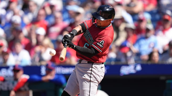 Apr 12, 2026; Philadelphia, Pennsylvania, USA; Arizona Diamondbacks infielder Ildemaro Vargas (6) hits a double against the Philadelphia Phillies in the sixth inning at Citizens Bank Park. Mandatory Credit: Kyle Ross-Imagn Images