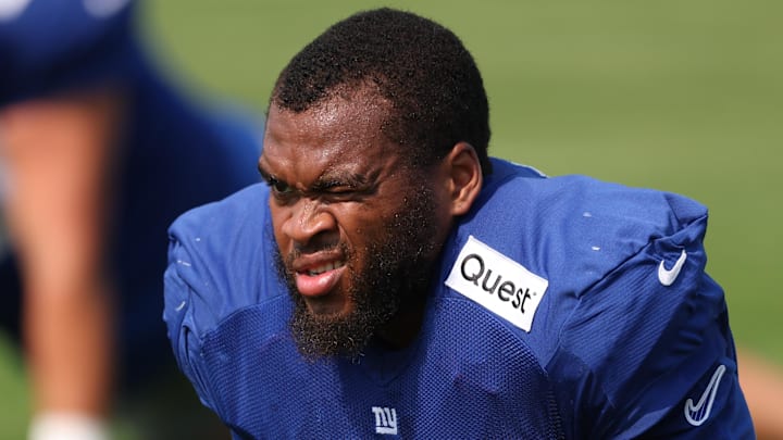 Aug 4, 2025; East Rutherford, NJ, USA; New York Giants offensive tackle Evan Neal (73) on the field during training camp at Quest Diagnostics Training Center. 