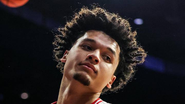 Arizona Wildcats guard Brayden Burries (5) reacts after he dunks the ball over the Denver Pioneers during the second half of the game at McKale Memorial Center on November 24, 2025.