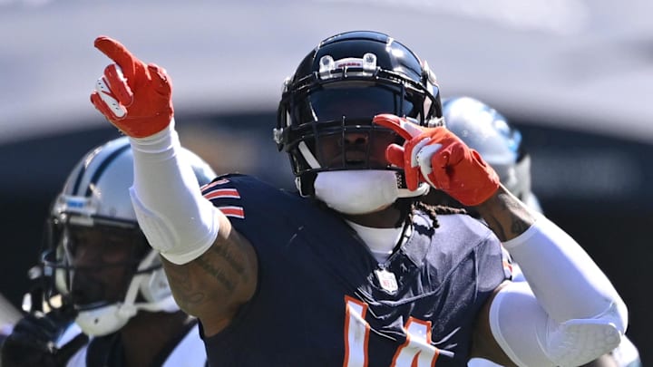 Former Chicago Bears tight end Gerald Everett (14) celebrates a first down after a catch against the Carolina Panthers 