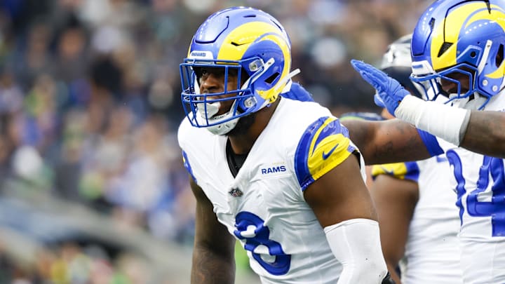 Nov 3, 2024; Seattle, Washington, USA; Los Angeles Rams linebacker Jared Verse (8) celebrates with cornerback Cobie Durant (14) after a sack against the Seattle Seahawks during the second quarter at Lumen Field. Mandatory Credit: Joe Nicholson-Imagn Images