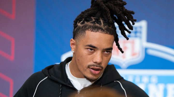 Feb 27, 2026; Indianapolis, IN, USA; Southern California wideout Makai Lemon (WO29) speaks to members of the media during the NFL Combine at the Indiana Convention Center. 