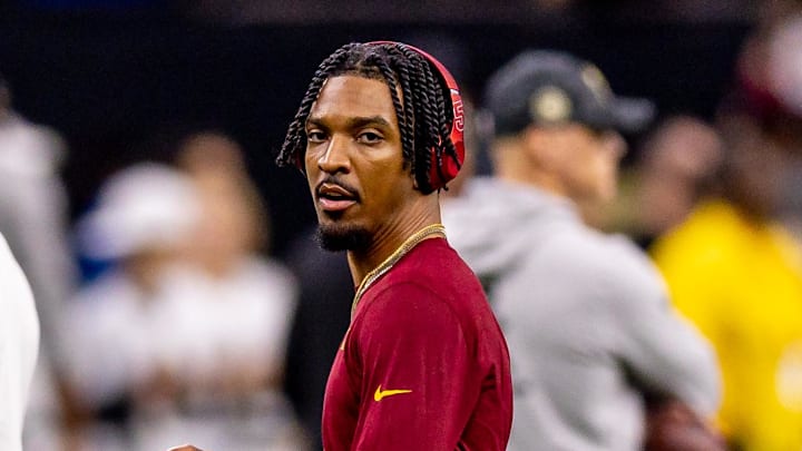 Dec 15, 2024; New Orleans, Louisiana, USA;  Washington Commanders quarterback Jayden Daniels (5) during warmups before the game against the New Orleans Saints at Caesars Superdome. Mandatory Credit: Stephen Lew-Imagn Images