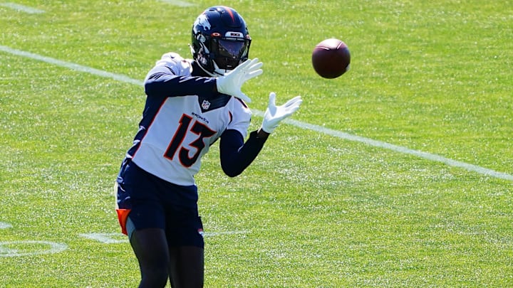 May 24, 2021; Englewood, Colorado, USA; Denver Broncos cornerback Michael Ojemudia (13) during organized team activities at the UCHealth Training Center. 
