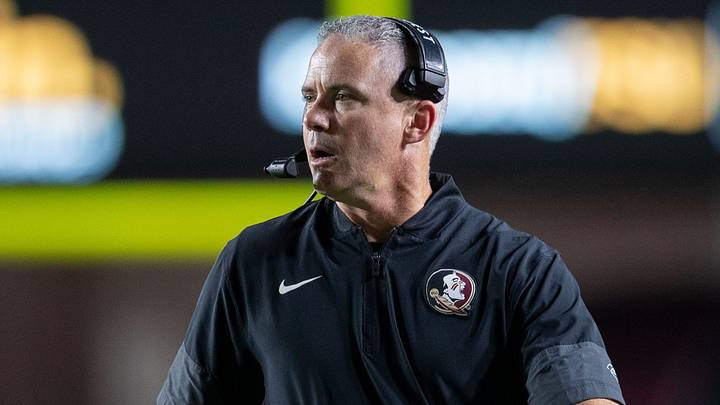 Florida State Seminoles head coach Mike Norvell talks into his headset during a timeout. The Florida State Seminoles defeated the New Mexico State Aggies 34-17 at Doak Campbell Stadium on Saturday, Aug. 29, 2026. Florida State Seminoles head coach Mike Norvell talks into his headset during a timeout. The Florida State Seminoles defeated the New Mexico State Aggies 34-17 at Doak Campbell Stadium on Saturday, Aug. 29, 2026.