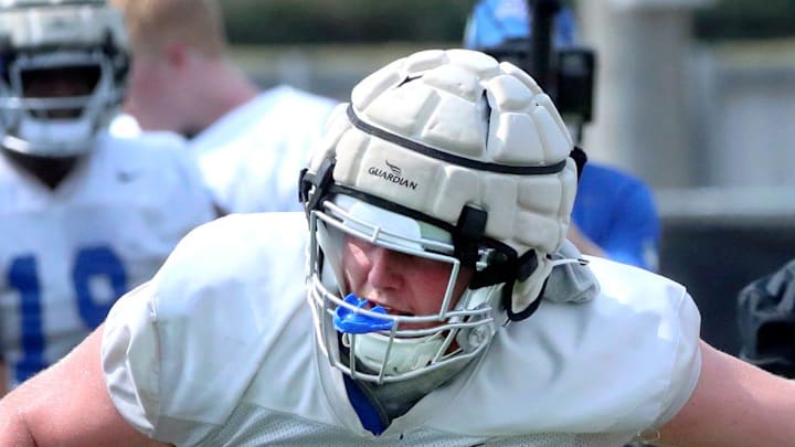 Keylan Rutledge comes off the line during MTSU's football practice.