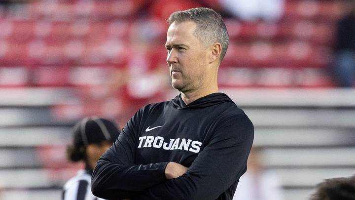 Oct 24, 2026; Madison, Wisconsin, USA; USC Trojans head coach Lincoln Riley watches his team during warmups before the game against the Wisconsin Badgers at Camp Randall Stadium. Oct 24, 2026; Madison, Wisconsin, USA; USC Trojans head coach Lincoln Riley watches his team during warmups before the game against the Wisconsin Badgers at Camp Randall Stadium.