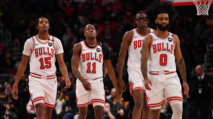 Feb 28, 2025; Chicago, Illinois, USA; (from left to right) Chicago Bulls forward Julian Phillips, guard Ayo Dosunmu, forward Jalen Smith, and guard Coby White are seen during a game against the Toronto Raptors at the United Center. Mandatory Credit: Patrick Gorski-Imagn Images Feb 28, 2025; Chicago, Illinois, USA; (from left to right) Chicago Bulls forward Julian Phillips, guard Ayo Dosunmu, forward Jalen Smith, and guard Coby White are seen during a game against the Toronto Raptors at the United Center. Mandatory Credit: Patrick Gorski-Imagn Images