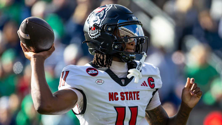 Oct 11, 2025; South Bend, Indiana, USA; NC State Wolfpack quarterback CJ Bailey (11) throws a pass against the Notre Dame Fighting Irish during the first half at Notre Dame Stadium. Mandatory Credit: Michael Caterina-Imagn Images Oct 11, 2025; South Bend, Indiana, USA; NC State Wolfpack quarterback CJ Bailey (11) throws a pass against the Notre Dame Fighting Irish during the first half at Notre Dame Stadium. Mandatory Credit: Michael Caterina-Imagn Images