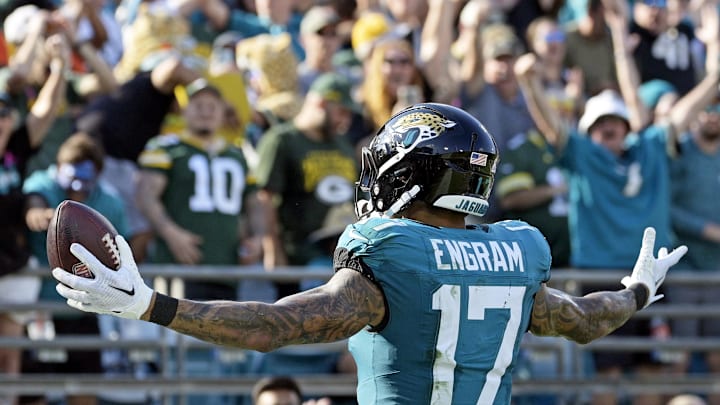 Oct 27, 2024; Jacksonville, Florida, USA; Jacksonville Jaguars tight end Evan Engram (17) catches a touchdown pass during the fourth quarter against the Green Bay Packers at EverBank Stadium. Mandatory Credit: Melina Myers-Imagn Images