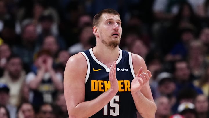 Mar 28, 2025; Denver, Colorado, USA; Denver Nuggets center Nikola Jokic (15) reacts in the third quarter against the Utah Jazz at Ball Arena. Mar 28, 2025; Denver, Colorado, USA; Denver Nuggets center Nikola Jokic (15) reacts in the third quarter against the Utah Jazz at Ball Arena.