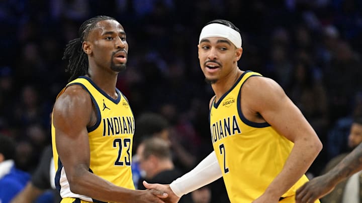 Jan 19, 2026; Philadelphia, Pennsylvania, USA; Indiana Pacers guard Aaron Nesmith (23) and guard Andrew Nembhard (2) celebrate against the Philadelphia 76ers during the second quarter at Xfinity Mobile Arena. Mandatory Credit: Eric Hartline-Imagn Images