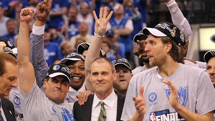 May 25, 2011; Dallas, TX, USA; Dallas Mavericks owner Mark Cuban (left) head coach Rick Carlisle (center) and forward Dirk Nowitzki celerbate a victory after game five against the Oklahoma City Thunder for the Western Conference Finals of the 2011 NBA playoffs at American Airlines Center. The Mavs beat the Thunder 100-96. Mandatory Credit: Matthew Emmons-Imagn Images