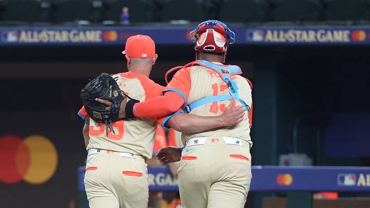 American League pitcher Kirby Yates of the Texas Rangers (39) and catcher Salvador Perez of the Kansas City Royals (13) react in the eighth inning during the 2024 MLB All-Star game at Globe Life Field on July 16, 2024 in Arlington, Texas. American League pitcher Kirby Yates of the Texas Rangers (39) and catcher Salvador Perez of the Kansas City Royals (13) react in the eighth inning during the 2024 MLB All-Star game at Globe Life Field on July 16, 2024 in Arlington, Texas.