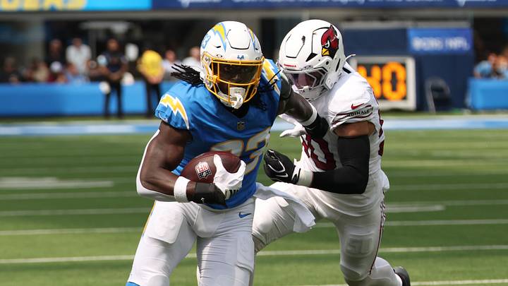 Sep 13, 2026; Inglewood, California, USA; Los Angeles Chargers tight end David Njoku (83) runs after the catch as Arizona Cardinals linebacker Jack Gibbens (50) defends during the first quarter at SoFi Stadium. Mandatory Credit: Kiyoshi Mio-Imagn Images Sep 13, 2026; Inglewood, California, USA; Los Angeles Chargers tight end David Njoku (83) runs after the catch as Arizona Cardinals linebacker Jack Gibbens (50) defends during the first quarter at SoFi Stadium. Mandatory Credit: Kiyoshi Mio-Imagn Images