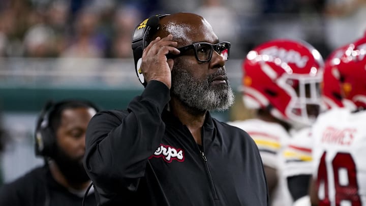 Maryland head coach Mike Locksley watches play from the Maryland sideline during a game against Michigan State at Ford Field.