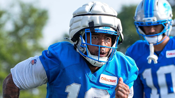Detroit Lions wide receiver Tim Patrick (12) practices during training camp at team's Performance Center Detroit Lions wide receiver Tim Patrick (12) practices during training camp at team's Performance Center