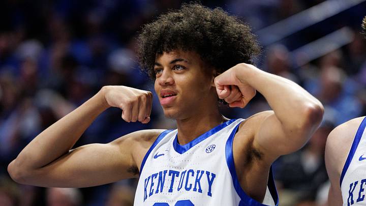 Oct 24, 2025; Lexington, KY, USA; Kentucky Wildcats forward Braydon Hawthorne (22) gestures in celebration from the bench during the second half against the Purdue Boilermakers at Rupp Arena at Central Bank Center. Mandatory Credit: Jordan Prather-Imagn Images