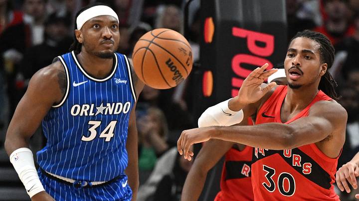 Oct 28, 2026; Toronto, Ontario, CAN; Toronto Raptors forward Collin Murray-Boyles (30) passes the ball away from Orlando Magic center Wendell Carter Jr. (34) in the second half at Scotiabank Arena. Mandatory Credit: Dan Hamilton-Imagn Images Oct 28, 2026; Toronto, Ontario, CAN; Toronto Raptors forward Collin Murray-Boyles (30) passes the ball away from Orlando Magic center Wendell Carter Jr. (34) in the second half at Scotiabank Arena. Mandatory Credit: Dan Hamilton-Imagn Images