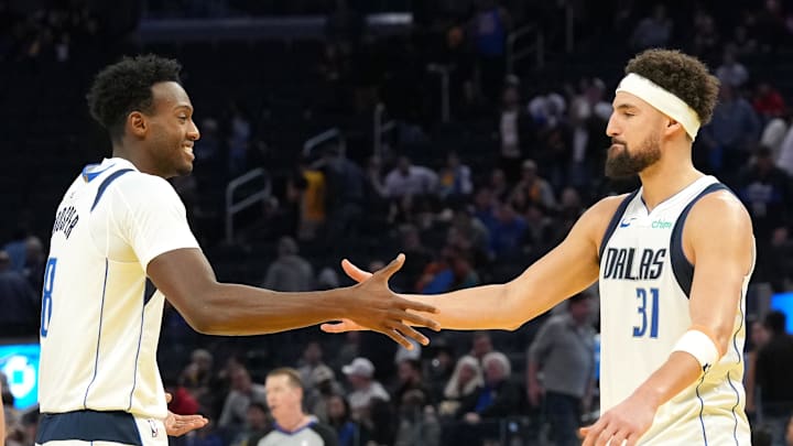 Dec 15, 2024; San Francisco, California, USA; Dallas Mavericks guard Klay Thompson (31) celebrates with forward Olivier-Maxence Prosper (8) after defeating the Golden State Warriors at Chase Center. Mandatory Credit: Darren Yamashita-Imagn Images