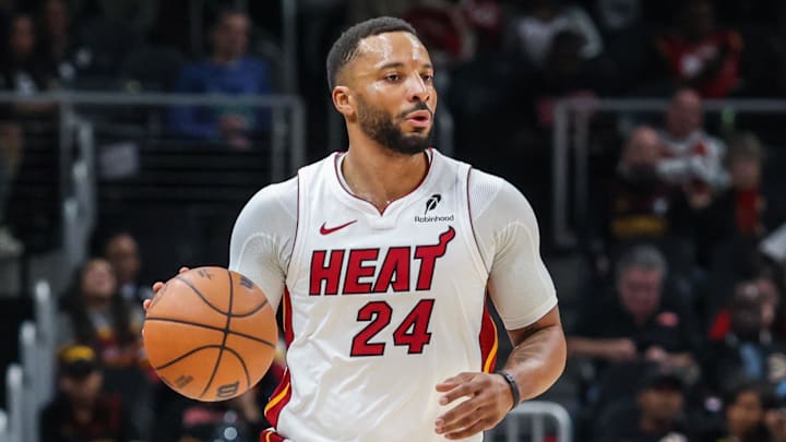 Dec 26, 2025; Atlanta, Georgia, USA; Miami Heat guard Norman Powell (24) dribbles the ball down the court against the Atlanta Hawks during the first quarter at State Farm Arena. Mandatory Credit: Jordan Godfree-Imagn Images