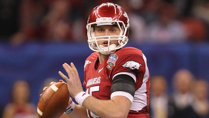 Arkansas Razorbacks quarterback Ryan Mallett (7) throws in the pocket against the Ohio State Buckeyes  during the 2011 Sugar Bowl at the Louisiana Superdome.