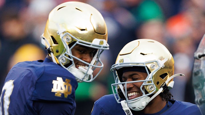 Notre Dame running back Jadarian Price celebrates with wide receiver Malachi Fields. Notre Dame running back Jadarian Price celebrates with wide receiver Malachi Fields.