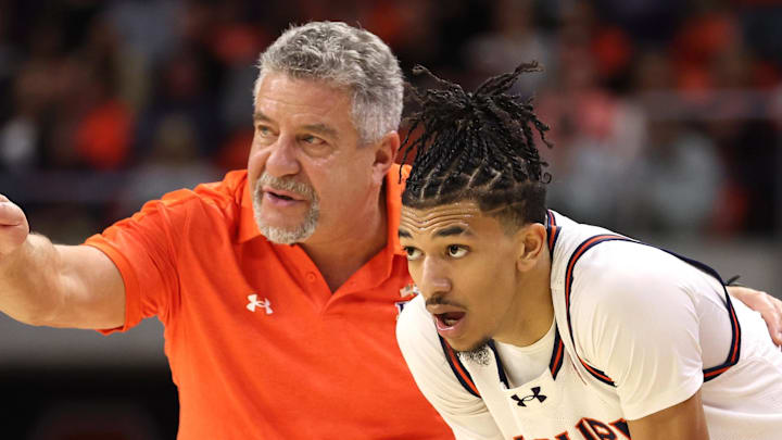 Jan 9, 2024; Auburn, Alabama, USA; Auburn Tigers head coach Bruce Pearl talks with guard Chad Baker-Mazara (10) during the second half against the Texas A&M Aggies at Neville Arena. Mandatory Credit: John Reed-Imagn Images