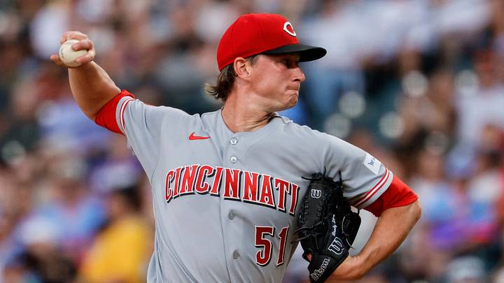 Cincinnati Reds starting pitcher Brady Singer (51) pitches