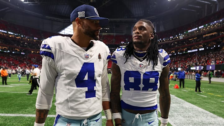 Dallas Cowboys stars Dak Prescott and CeeDee Lamb walk off the field after a game against the Atlanta Falcons 