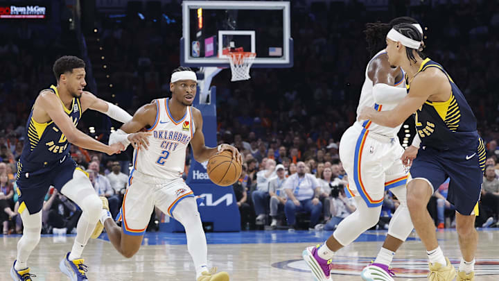 Mar 29, 2025; Oklahoma City, Oklahoma, USA; Oklahoma City Thunder guard Shai Gilgeous-Alexander (2) drives to the basket beside Indiana Pacers guard Tyrese Haliburton (0) during the second quarter at Paycom Center. Mandatory Credit: Alonzo Adams-Imagn Images Mar 29, 2025; Oklahoma City, Oklahoma, USA; Oklahoma City Thunder guard Shai Gilgeous-Alexander (2) drives to the basket beside Indiana Pacers guard Tyrese Haliburton (0) during the second quarter at Paycom Center. Mandatory Credit: Alonzo Adams-Imagn Images