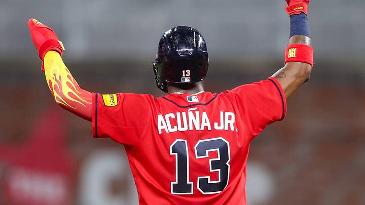 Aug 28, 2026; Atlanta, Georgia, USA; Atlanta Braves right fielder Ronald Acuna Jr. (13) reacts after a two-run home run by center fielder Michael Harris II (not pictured) against the Colorado Rockies in the fifth inning at Truist Park. Mandatory Credit: Brett Davis-Imagn Images