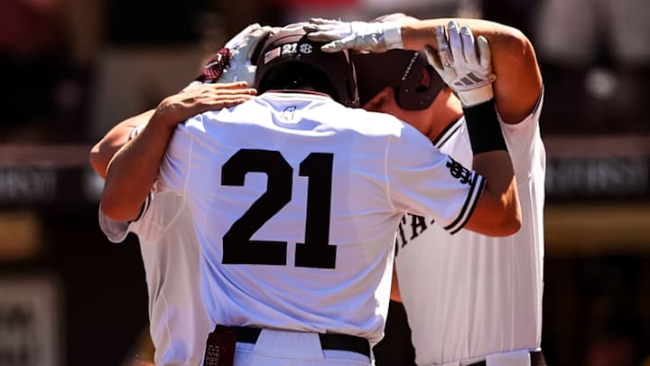 Mississippi State players celebrate a first inning home run by Kevin Milewski in a 17-7 run-rule victory over Vanderbilt. 
