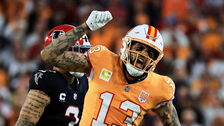 Tampa Bay Buccaneers wide receiver Mike Evans (13) reacts after catching a pass against Atlanta Falcons safety Jessie Bates III 