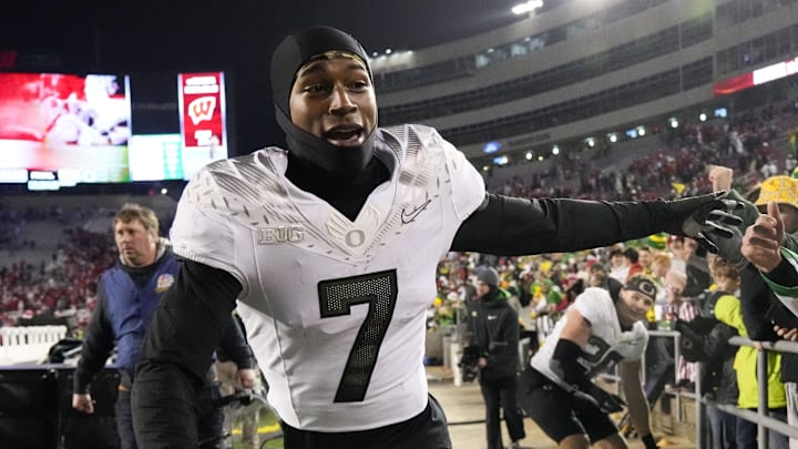 Nov 16, 2024; Madison, Wisconsin, USA;  Oregon Ducks wide receiver Evan Stewart (7) greets fans following the game against the Wisconsin Badgers at Camp Randall Stadium. Mandatory Credit: Jeff Hanisch-Imagn Images