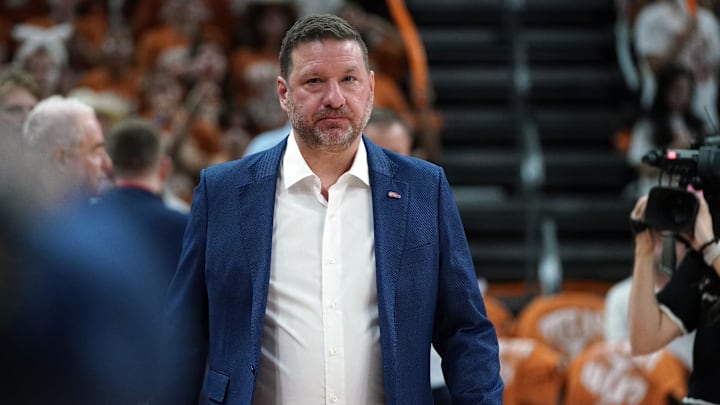 Ole Miss Rebels head coach Chris Beard enters the court before the start of the game against the Texas Longhorns at Moody Center. 