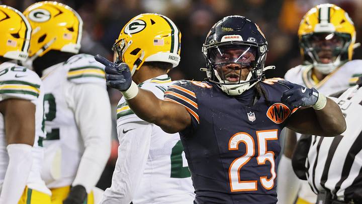 Dec 20, 2025; Chicago, Illinois, USA; Chicago Bears running back Kyle Monangai (25) gestures toward the Green Bay Packers end zone after running for a first down during overtime at Soldier Field. Mandatory Credit: Mike Dinovo-Imagn Images