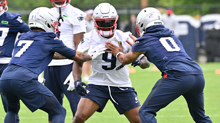 Jun 9, 2025; Foxborough, MA, USA; New England Patriots wide receiver Kayshon Boutte (9) works with cornerback Carlton Davis III (7) and cornerback Christian Gonzalez (0) during minicamp at Gillette Stadium. Mandatory Credit: Eric Canha-Imagn Images