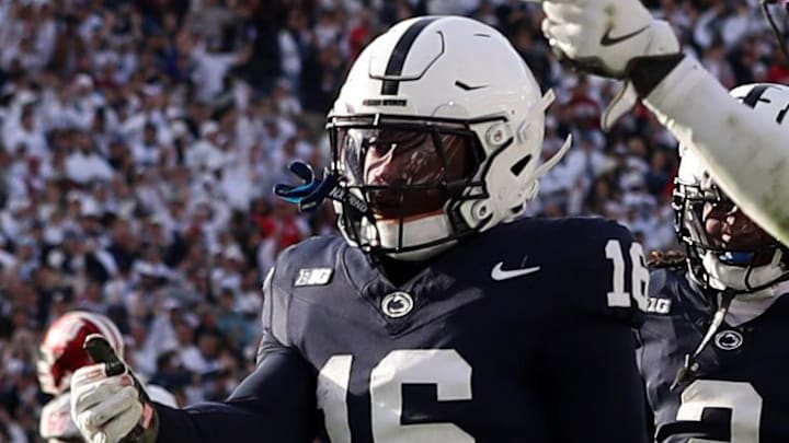 Nov 8, 2025; University Park, Pennsylvania, USA; Penn State Nittany Lions safety King Mack (16) celebrates with teammates after intercepting the ball during the fourth quarter against the Indiana Hoosiers at Beaver Stadium. Mandatory Credit: Matthew O'Haren-Imagn Images