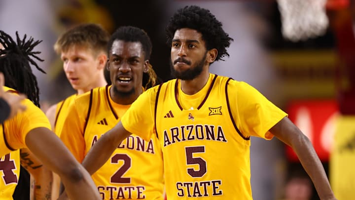 Jan 24, 2026; Tempe, Arizona, USA; Arizona State Sun Devils guard Maurice Odum (5) celebrates with teammates against the Cincinnati Bearcats in the second half at Desert Financial Arena. Mandatory Credit: Mark J. Rebilas-Imagn Images