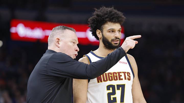 Mar 9, 2025; Oklahoma City, Oklahoma, USA; Denver Nuggets head coach Michael Malone talks to guard Jamal Murray (27) during a break in the game against the Oklahoma City Thunder during the second quarter at Paycom Center. Mandatory Credit: Alonzo Adams-Imagn Images