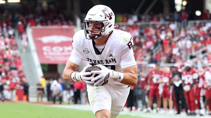 Oct 18, 2025; Fayetteville, Arkansas, USA; Texas A&M Aggies tight end Nate Boerkircher (87) scores a touchdown in the second quarter against the Arkansas Razorbacks at Donald W. Reynolds Razorback Stadium. Mandatory Credit: Nelson Chenault-Imagn Images Oct 18, 2025; Fayetteville, Arkansas, USA; Texas A&M Aggies tight end Nate Boerkircher (87) scores a touchdown in the second quarter against the Arkansas Razorbacks at Donald W. Reynolds Razorback Stadium. Mandatory Credit: Nelson Chenault-Imagn Images