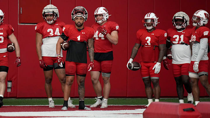 Wisconsin running back Chez Mellusi (1) is shown with his unit during spring football practice Thursday, April 25, 2024 in Madison, Wisconsin. The Wisconsin Badgers football team plays their season opener against Western Michigan on August 31.