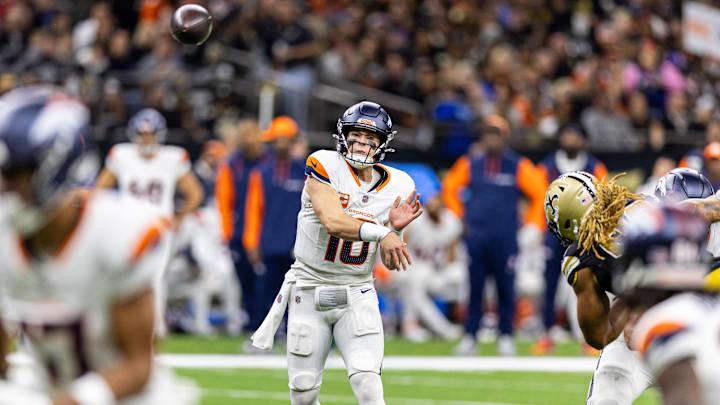 Oct 17, 2024; New Orleans, Louisiana, USA;  Denver Broncos quarterback Bo Nix (10) passes against the New Orleans Saints during the first half at Caesars Superdome. 