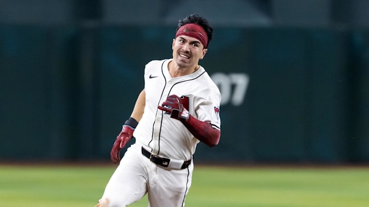 Aug 19, 2025; Phoenix, Arizona, USA; Arizona Diamondbacks outfielder Corbin Carroll runs to third after hitting an RBI triple in the fifth inning against the Cleveland Guardians at Chase Field. Mandatory Credit: Mark J. Rebilas-Imagn Images