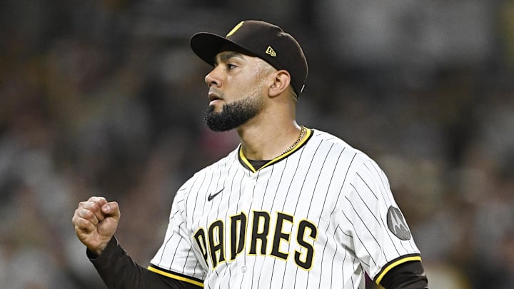 Sep 27, 2025; San Diego, California, USA; San Diego Padres relief pitcher Robert Suarez (75) pumps his fist after the Padres beat the Arizona Diamondbacks at Petco Park. Mandatory Credit: Denis Poroy-Imagn Images